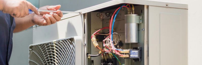 Furnace technician repairing a heating system in Las Vegas NV